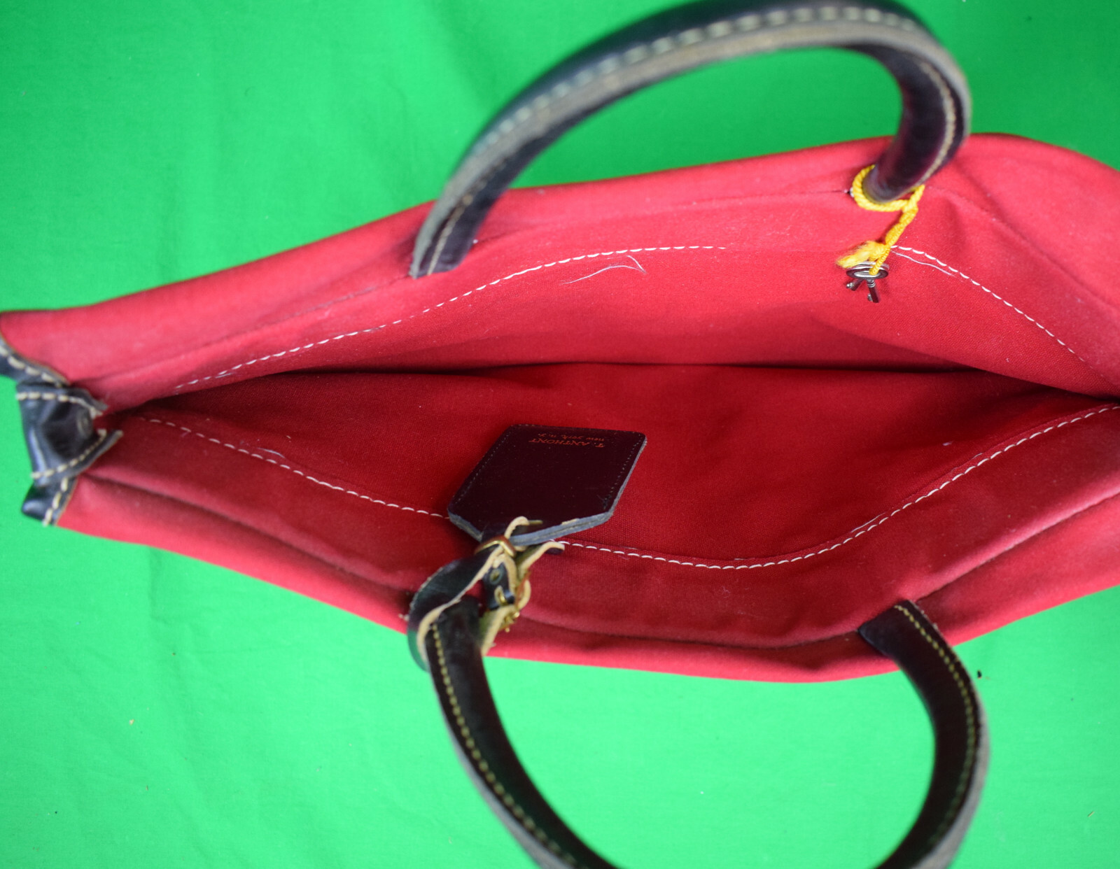 “T. Anthony Red Canvas Carrier Bag w/ Luggage Tag”