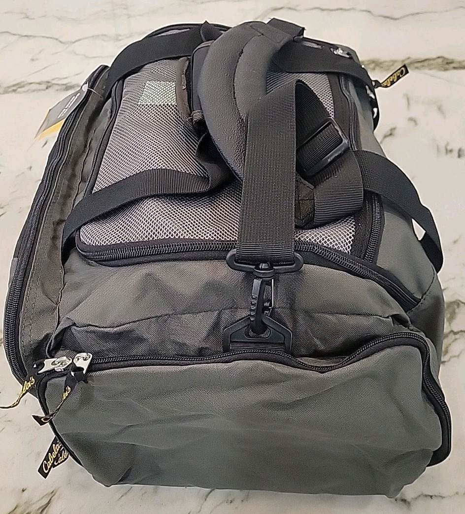 Cabela’s travel bag (6028). Zipper Closure. New. Gray Color. For Man Or Women.