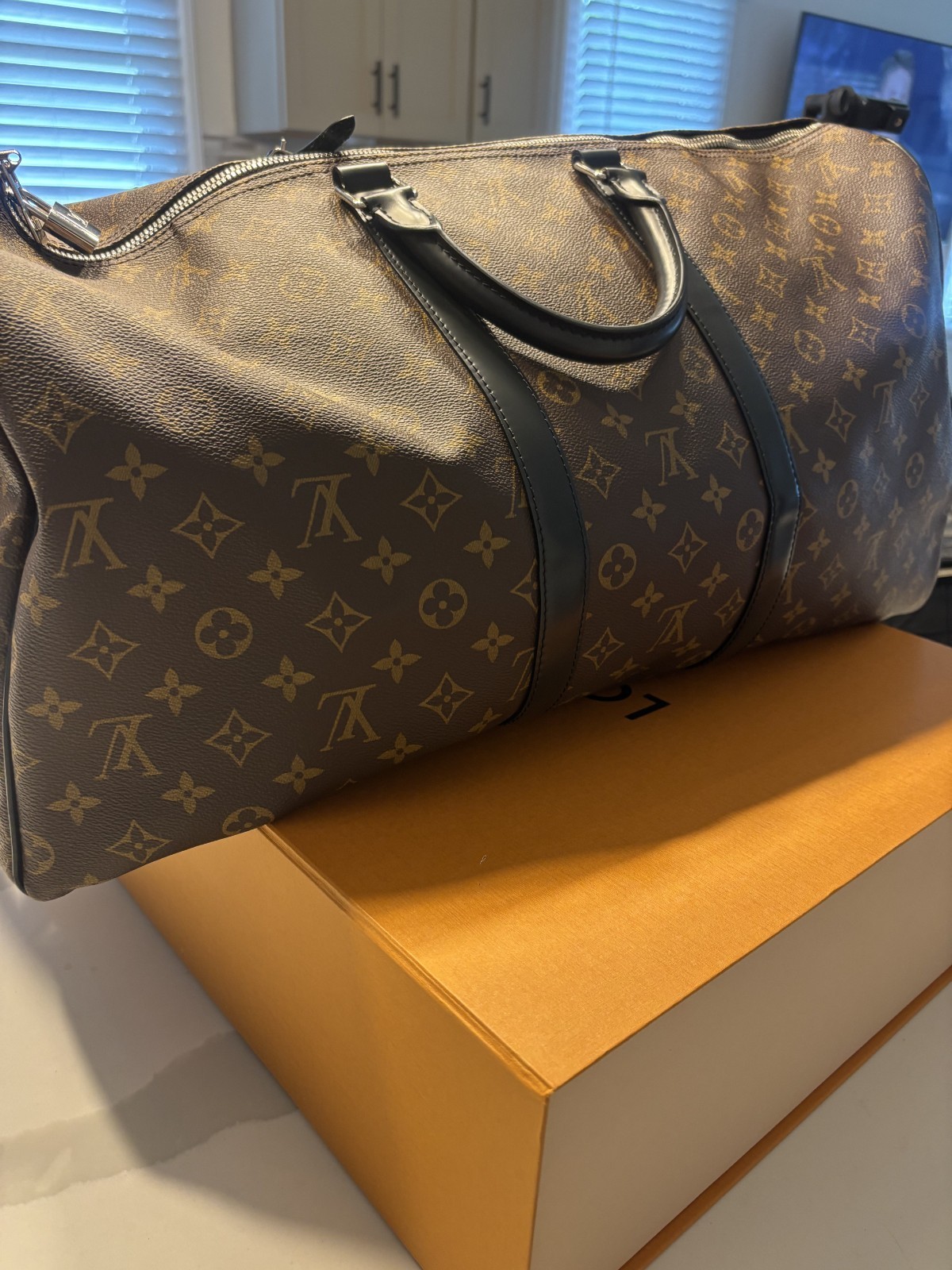 LOUIS VUITTON Keepall Bandoulière 55 in Monogram Macassar Canvas & Leather