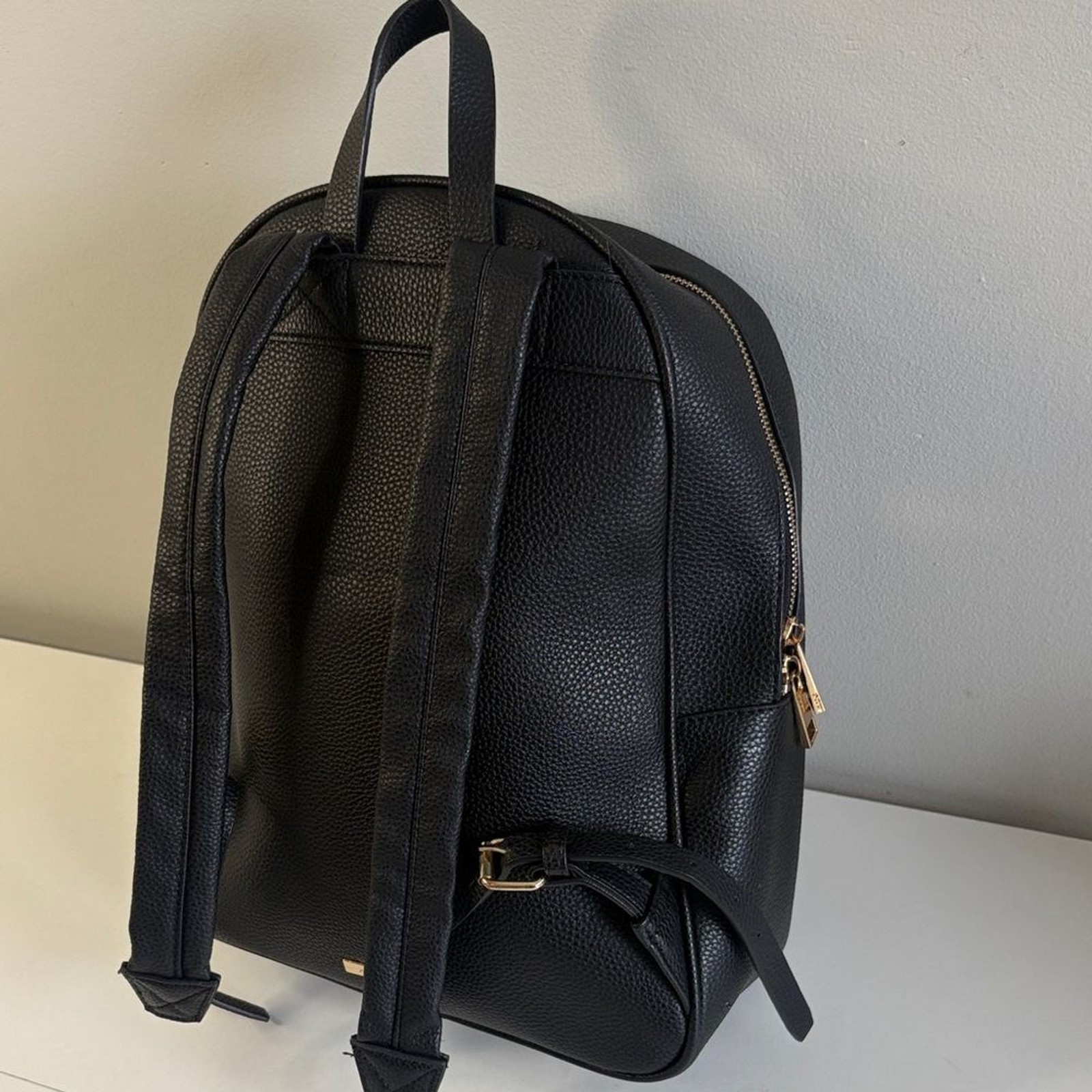 ALDO Black Pebbled Faux Leather Backpack Gold Zipper Minimalist Bag