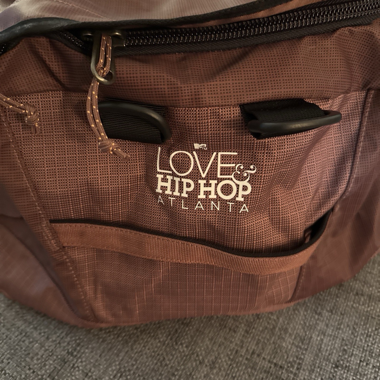 Brand New Patagonia Black Hole Duffel 55L w cute small MTV Hiphop logo