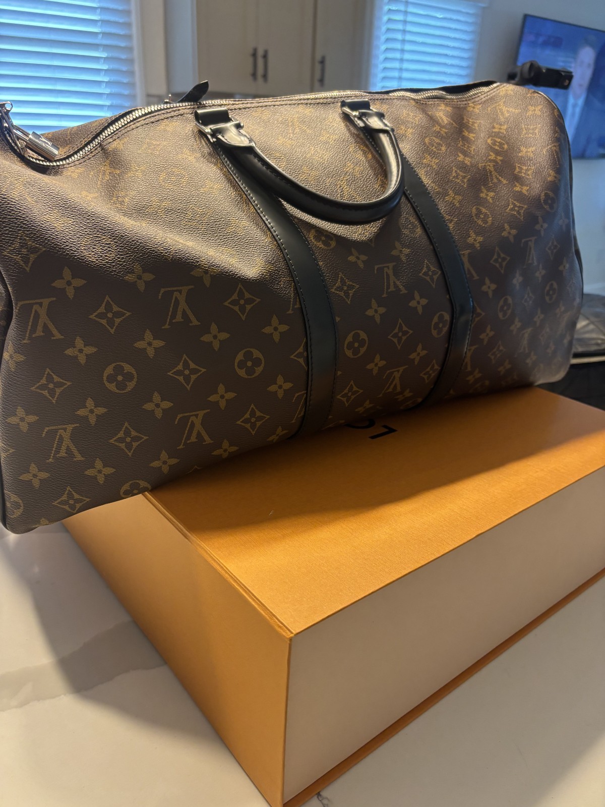LOUIS VUITTON Keepall Bandoulière 55 in Monogram Macassar Canvas & Leather