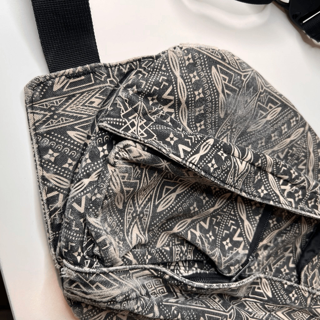 This item is a KAVU Rope Bag with a geometric black and white design