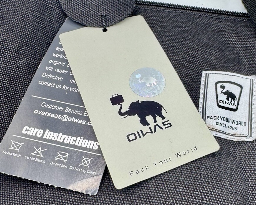 OIWAS Pack Your World Messenger Backpack NewWith Tags