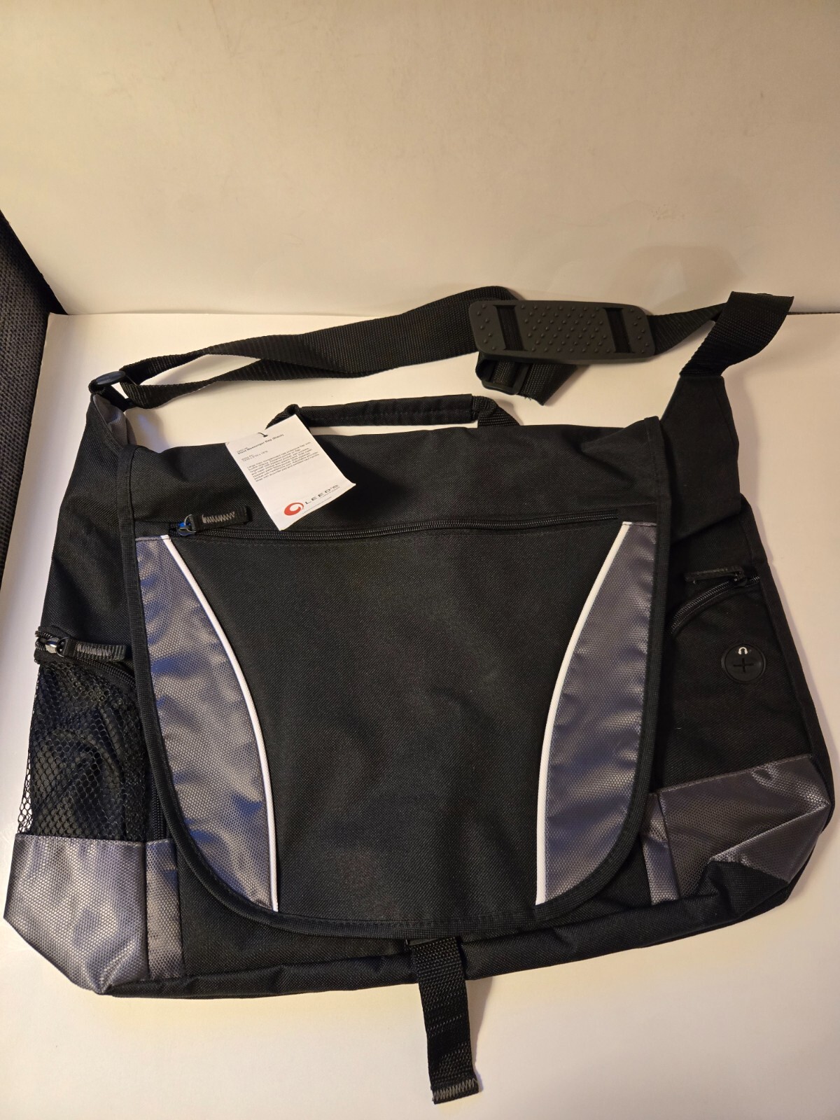 New with Tags Leeds Slant Messenger Bag Black And Grey 7850-06 14x18x5