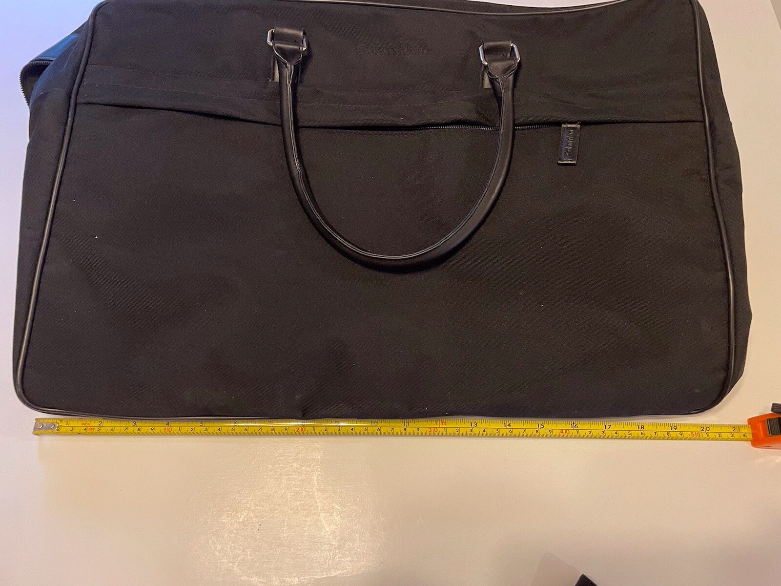 Calvin Klein 100% Polyester travel duffle bag black, shoulder strap, And Handles