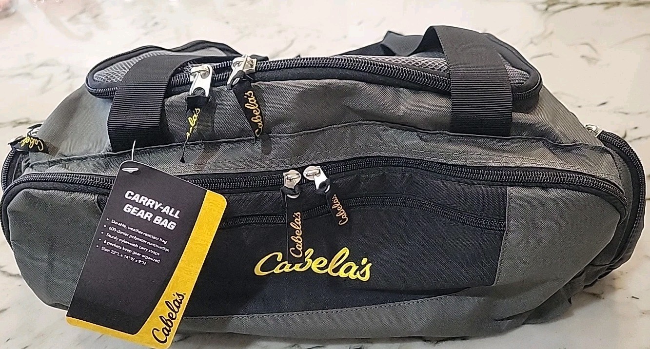 Cabela’s travel bag (6028). Zipper Closure. New. Gray Color. For Man Or Women.