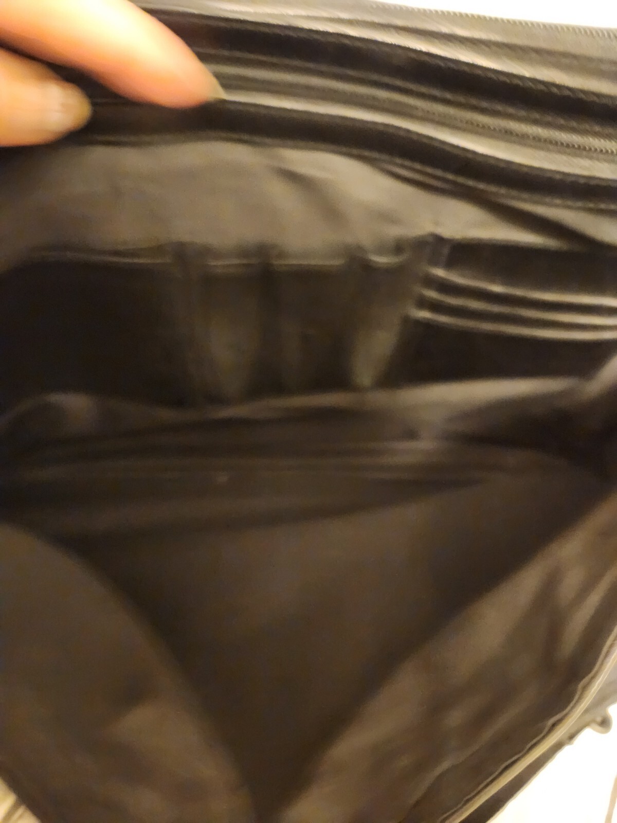 Black leather briefcase. Soft, Expands. W/ shoulder Strap