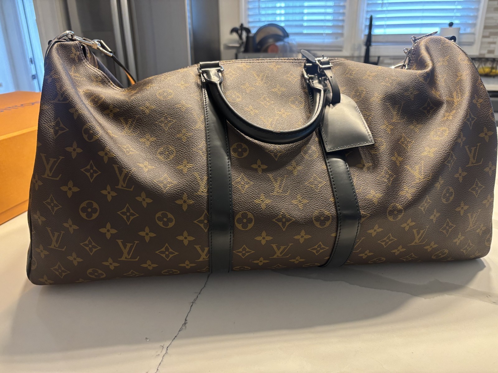 LOUIS VUITTON Keepall Bandoulière 55 in Monogram Macassar Canvas & Leather