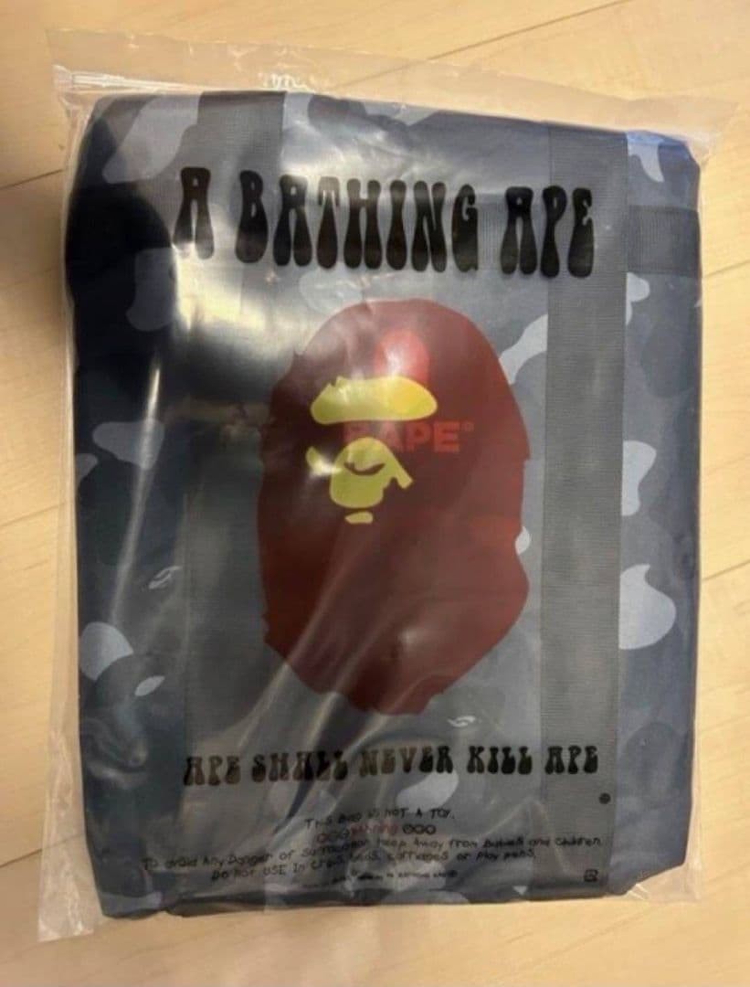 A BATHING APE BAPE Black CAMO Duffel Bag SPRING Collection 2022 book appendix
