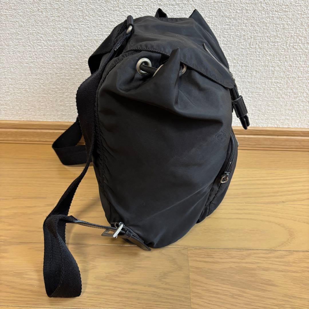 Prada Rucks Saffiano Triangular Plate