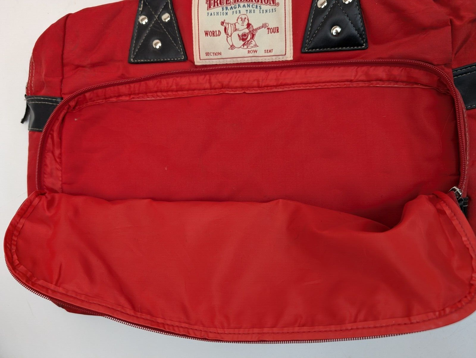 True Religion Fragrances Buddha World Tour Duffel Bag FLAWED