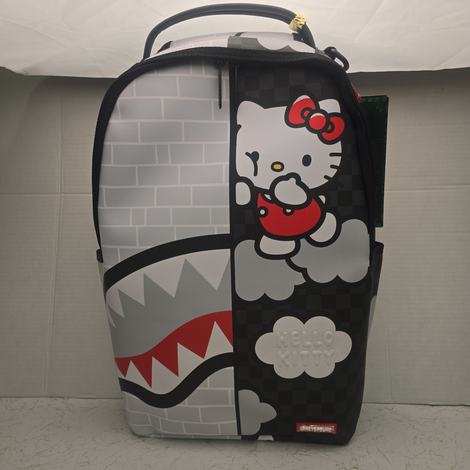 Sprayground – Hello Kitty Brick Wall Split Backpack Special Edition Colab.