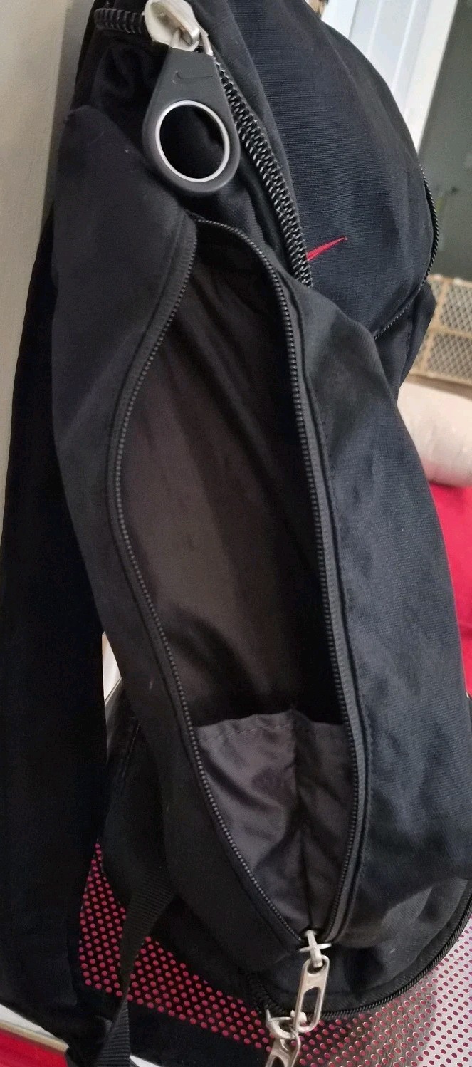 Retro Black and Red Nike Hoops Backpack Holds a Basketball