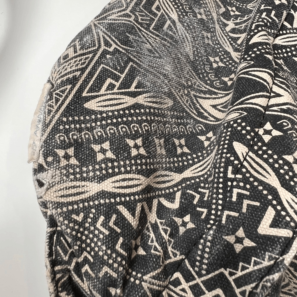 This item is a KAVU Rope Bag with a geometric black and white design