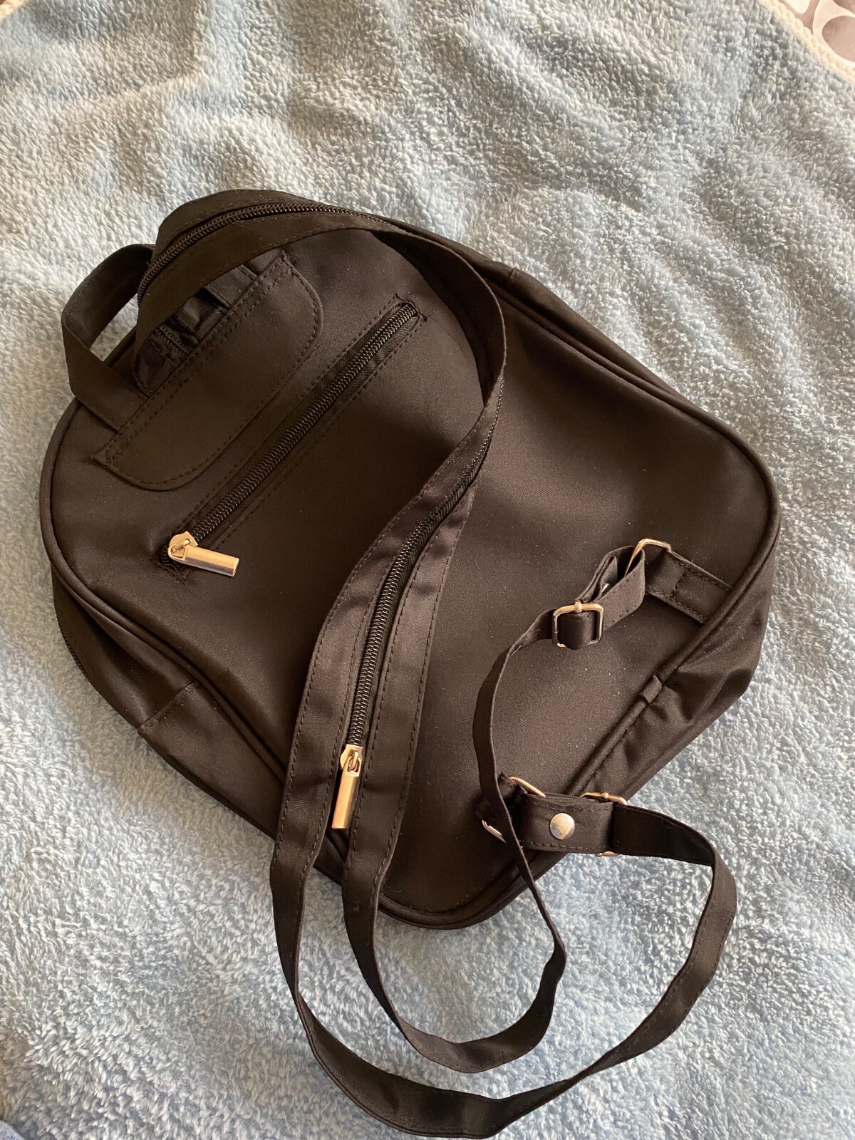 Sieber black flat backpack. Oval shape, New. Germany.