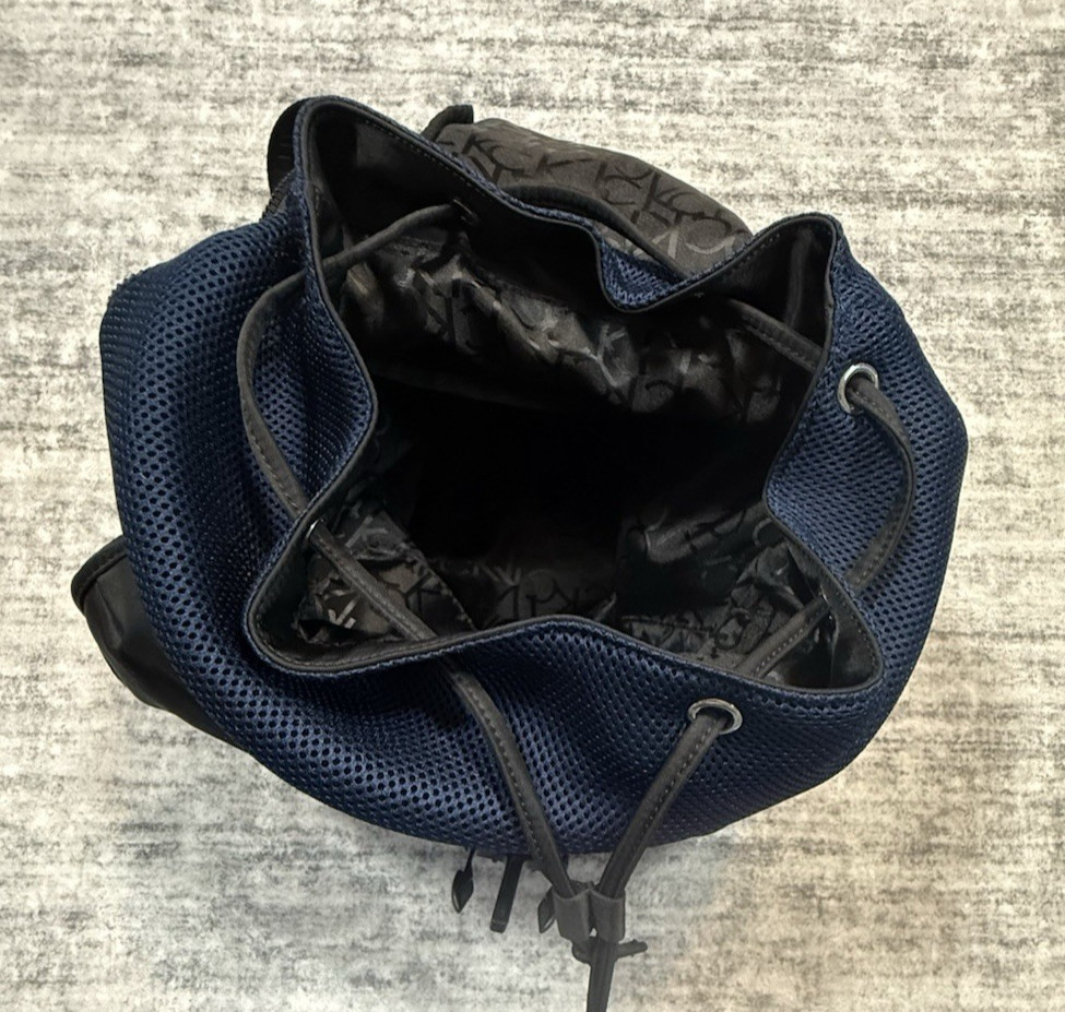Calvin Klein Flap Top Flap Black/Blue Fabric Weave 18″ Backpack Pockets Logo