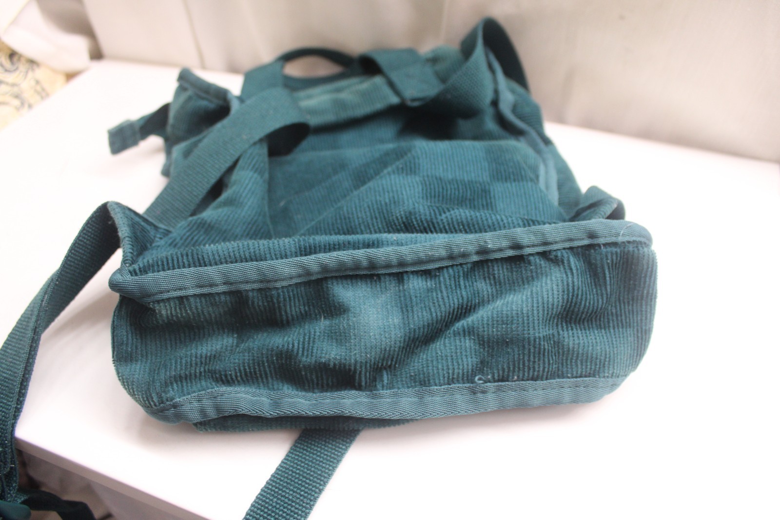 Vans Mini Free Hand backpack in a deep teal corduroy Checkerboard 10X11X3inches