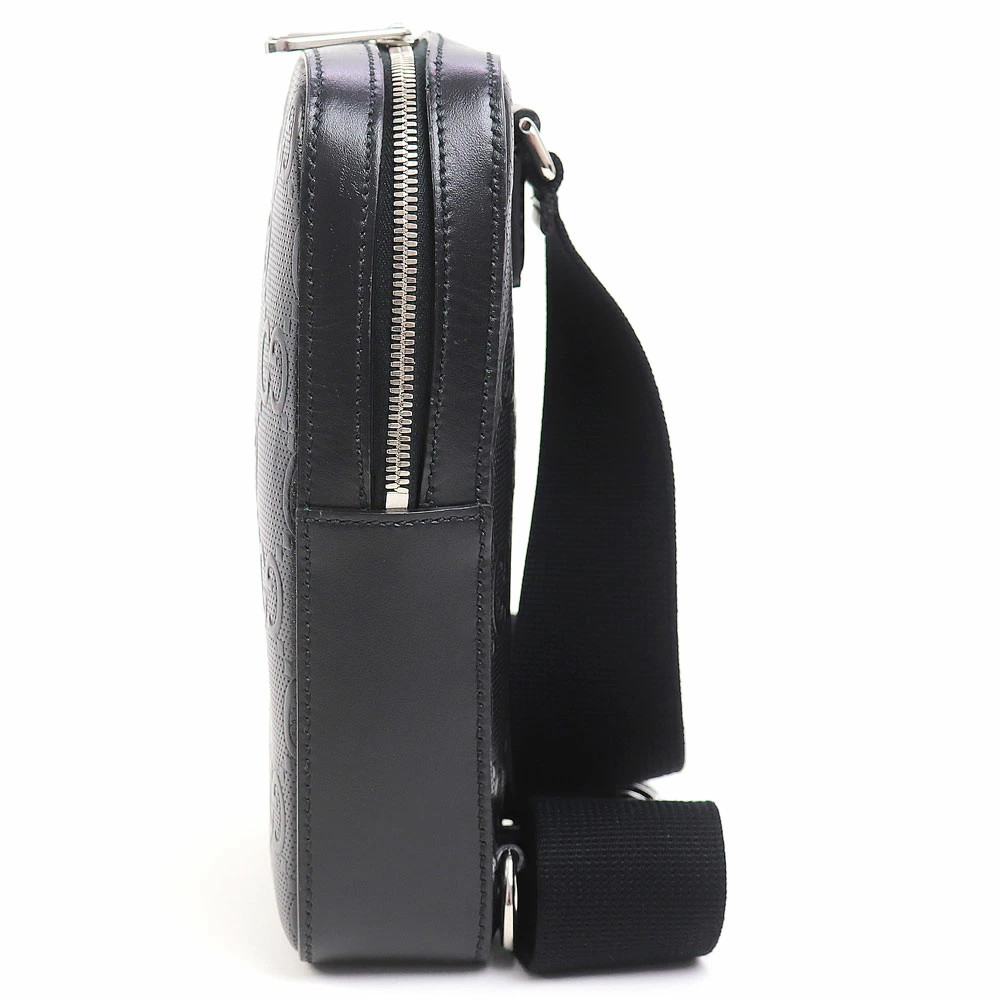 Gucci GG Embossed Sling Backpack Black Perforated Leather Crossbody Shoulder Bag