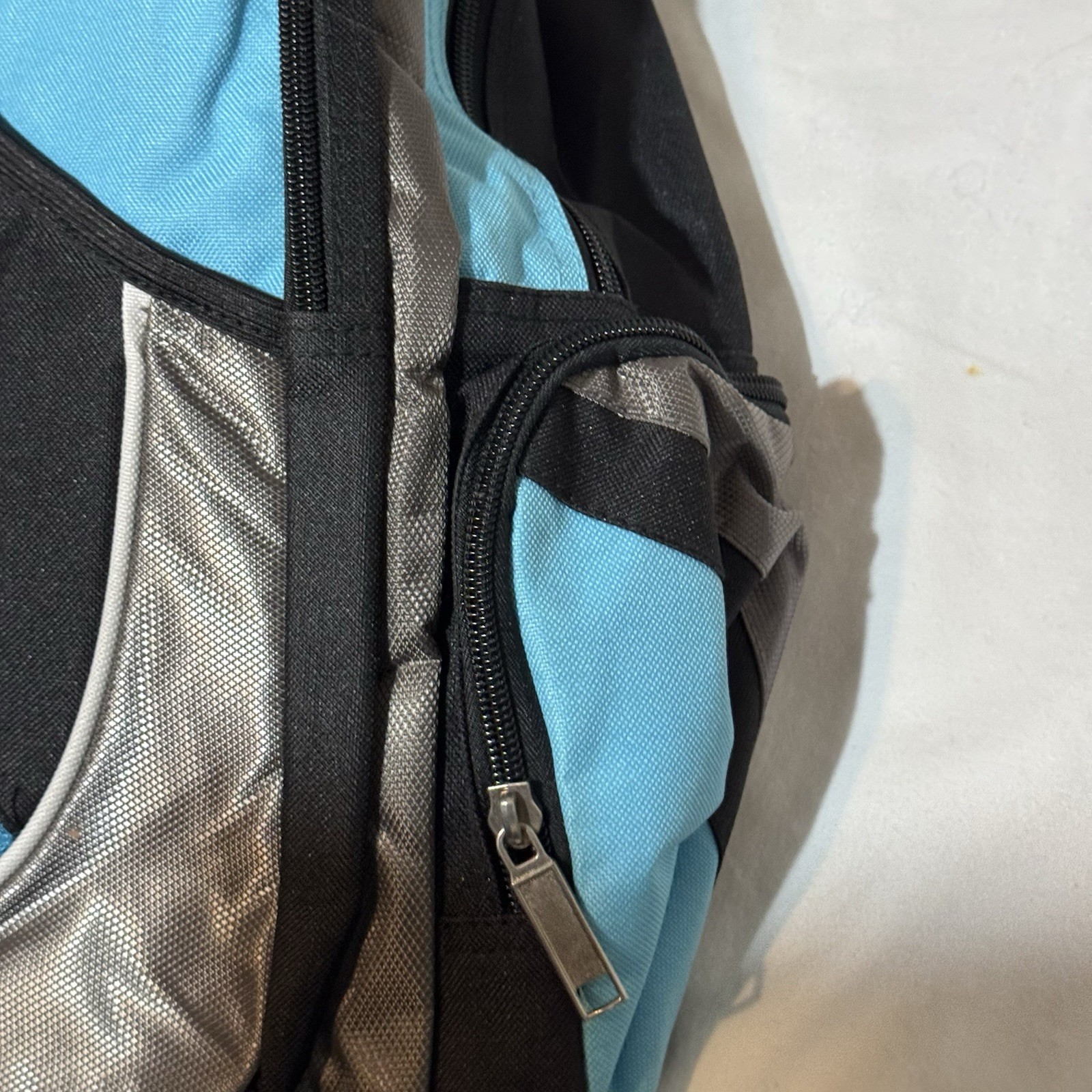 Blue & Black Multi-Pocket Backpack – Audio Port – Lightweight & Durable