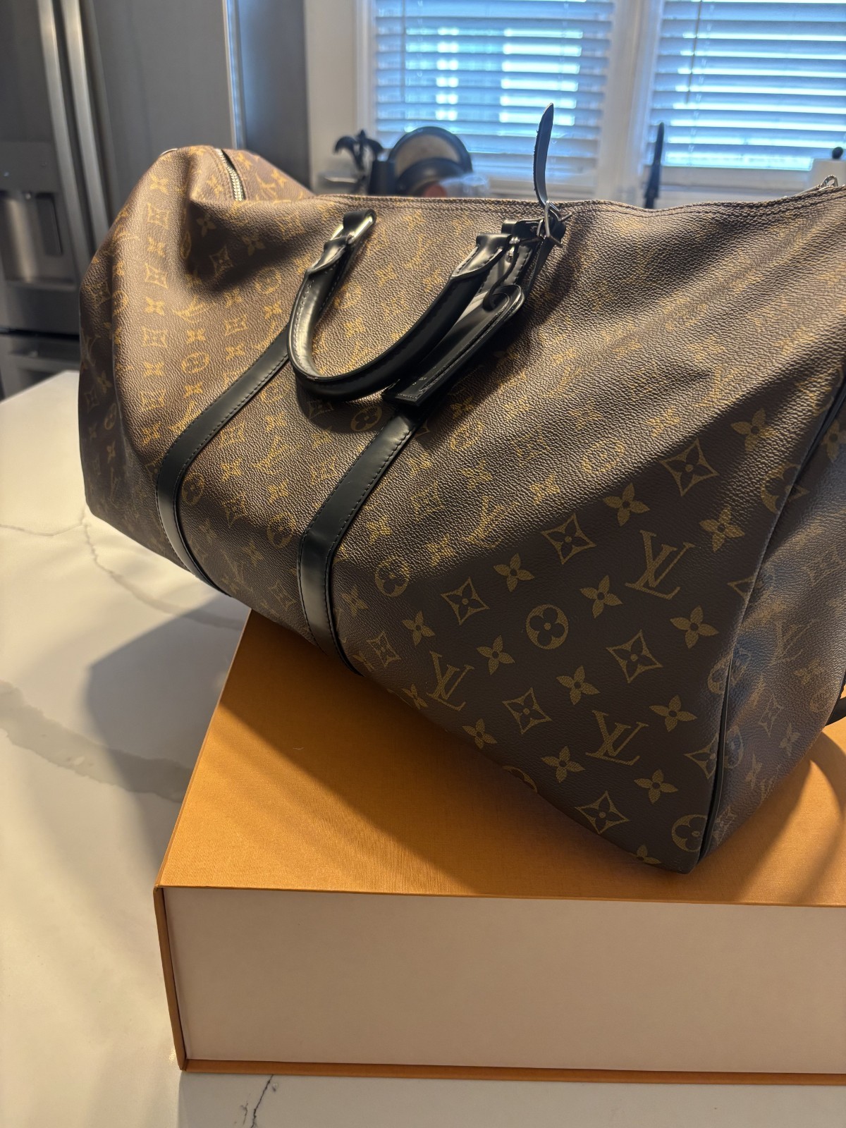 LOUIS VUITTON Keepall Bandoulière 55 in Monogram Macassar Canvas & Leather
