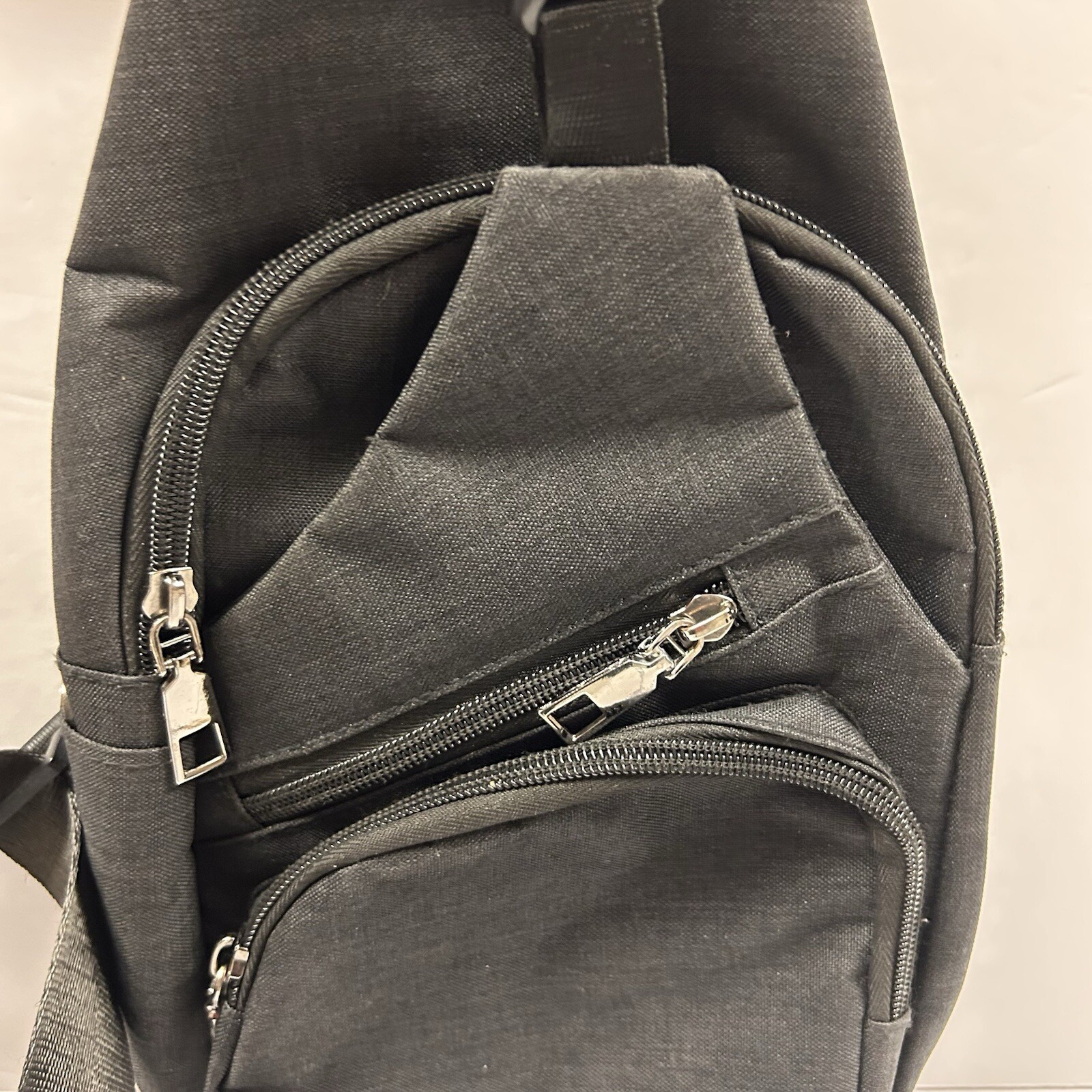 Nupouch One Strap Antitheft Black Sling Backpack with USB Charging Cable