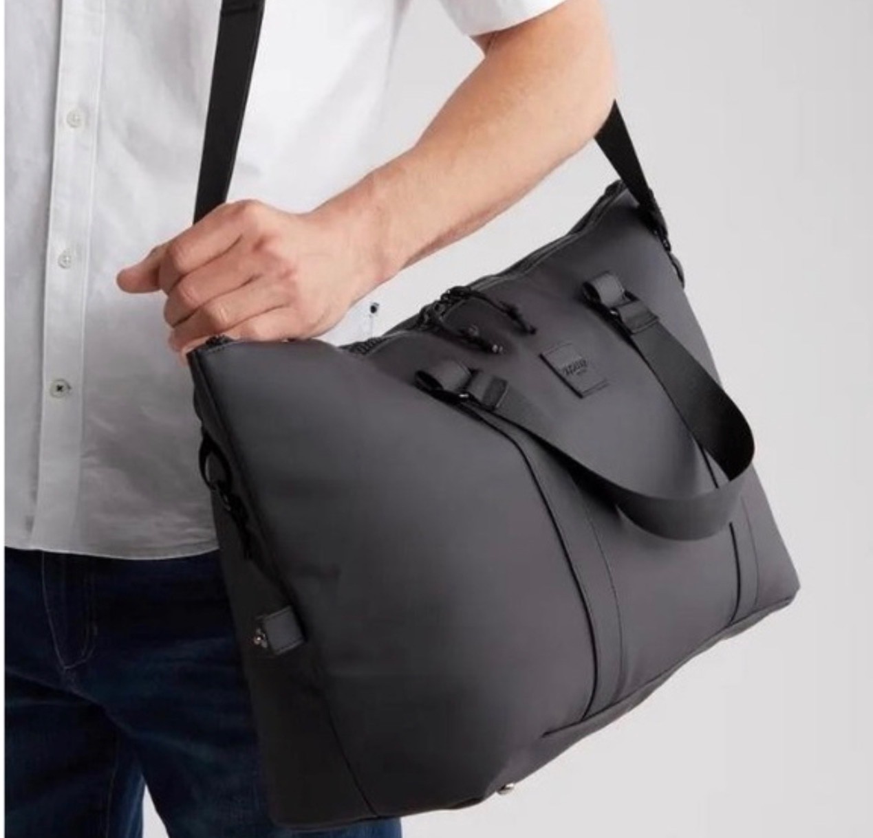 Duchamp London Duffle Bag With Strap & USB Cable in Black-$240