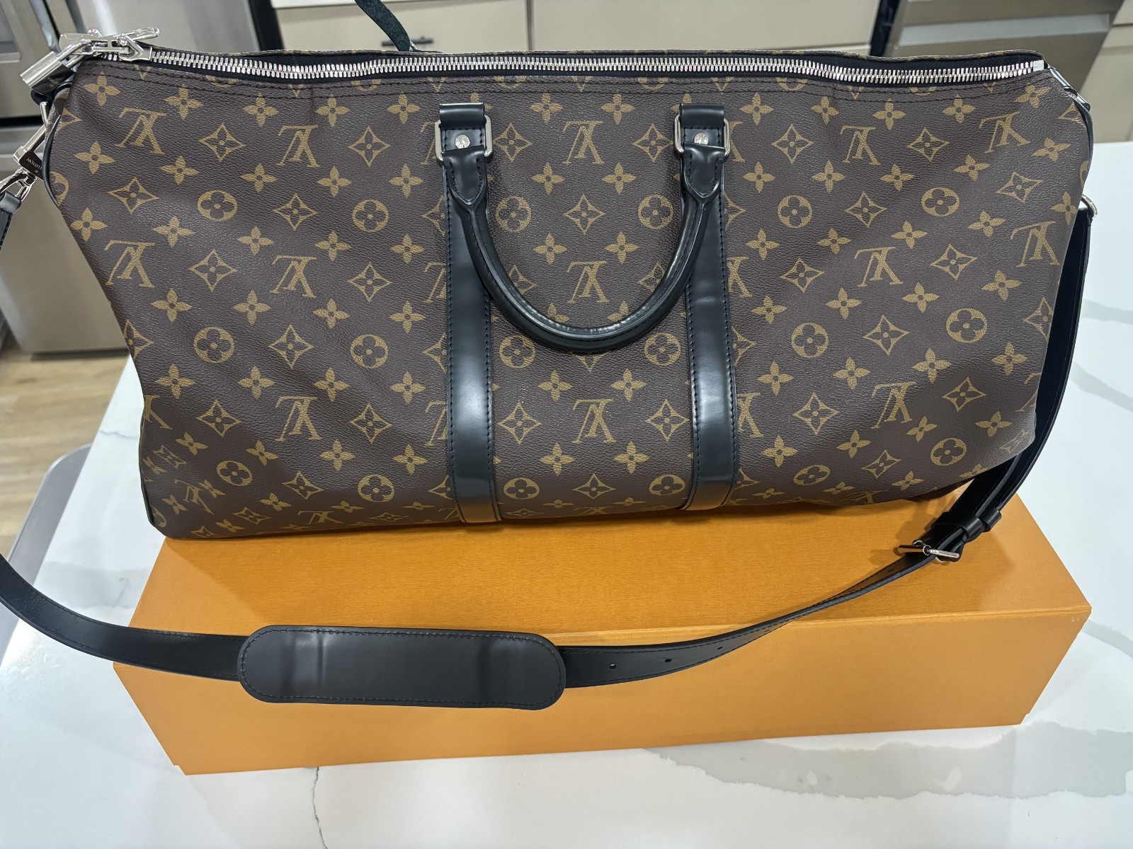LOUIS VUITTON Keepall Bandoulière 55 in Monogram Macassar Canvas & Leather