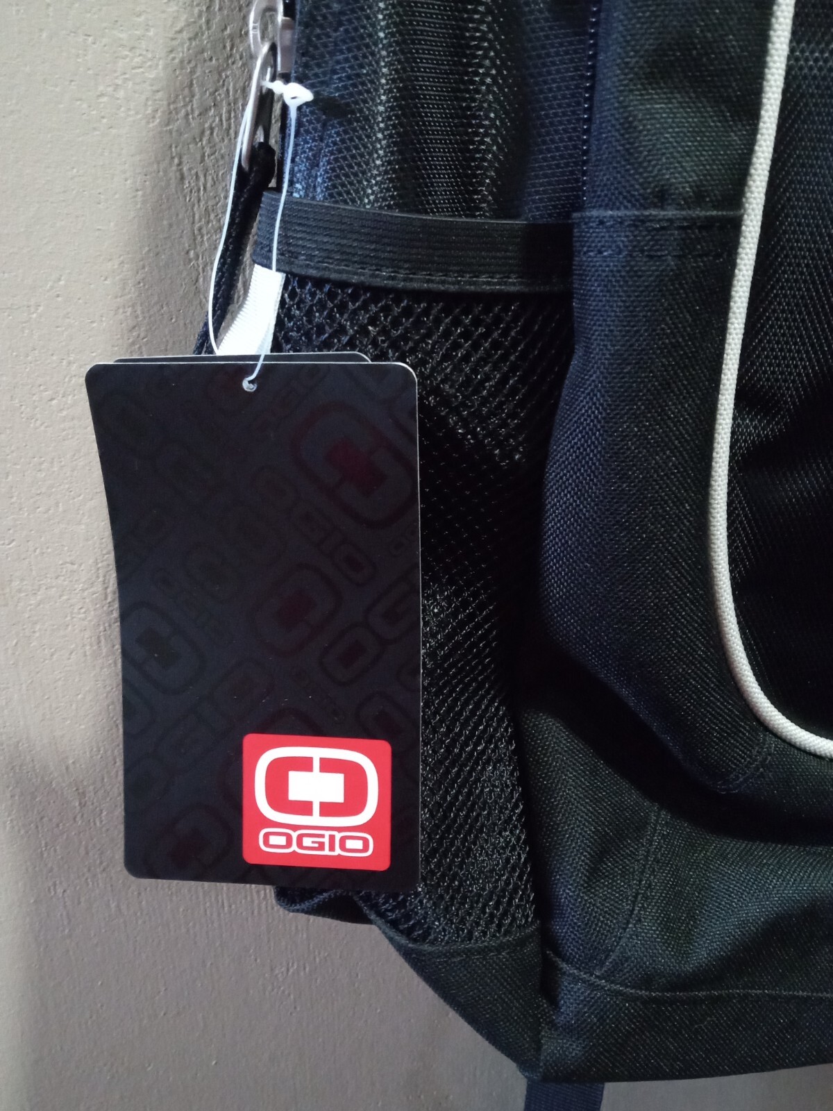 Ogio ‘Carbon’ Black Embroidered Alaris Logo Audio Pocket Headphone Port Backpack