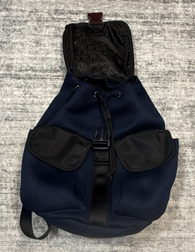 Calvin Klein Flap Top Flap Black/Blue Fabric Weave 18″ Backpack Pockets Logo