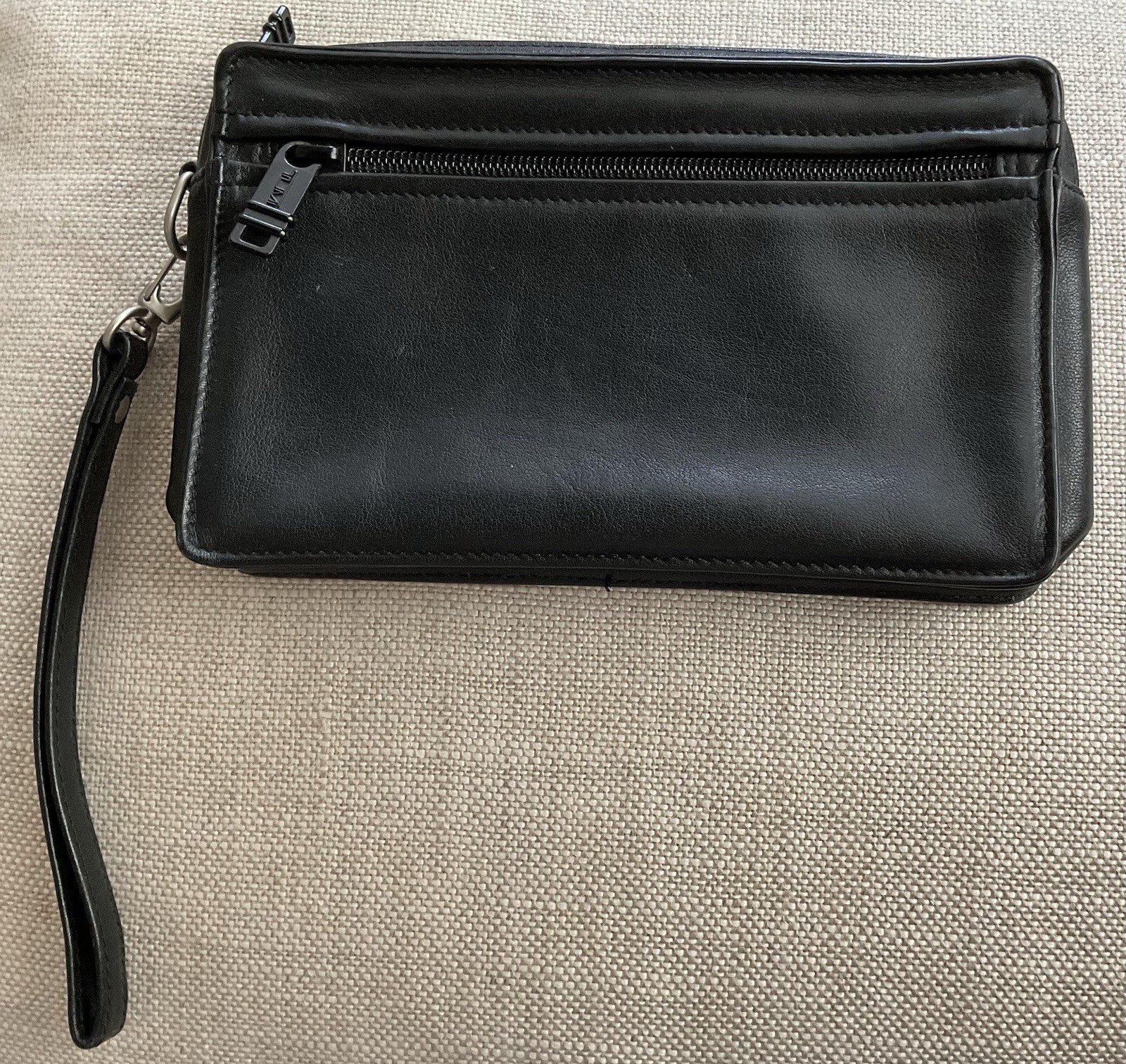 TUMI Man Clutch Bag Black Leather Wrist Strap Removable