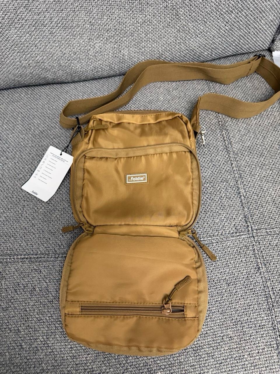 the foldie Small Brown Crossbody Sling Bag Zip Pockets Lined Adjustable Strap