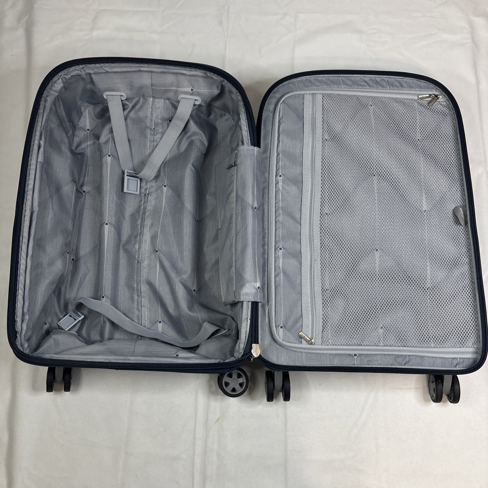 DELSEY Paris Clavel Hardside Expandable Luggage with Spinner Wheels Blue