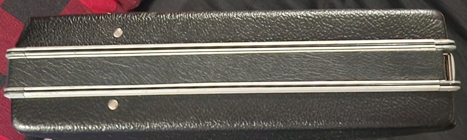 vintage black hard-shell briefcase