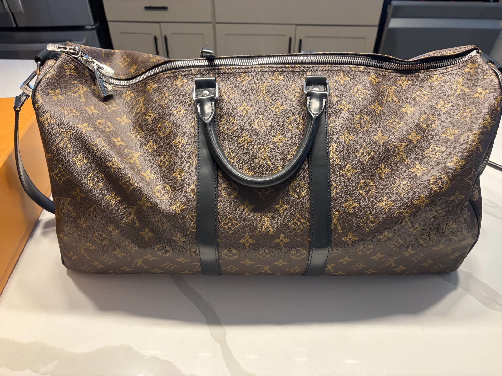 LOUIS VUITTON Keepall Bandoulière 55 in Monogram Macassar Canvas & Leather