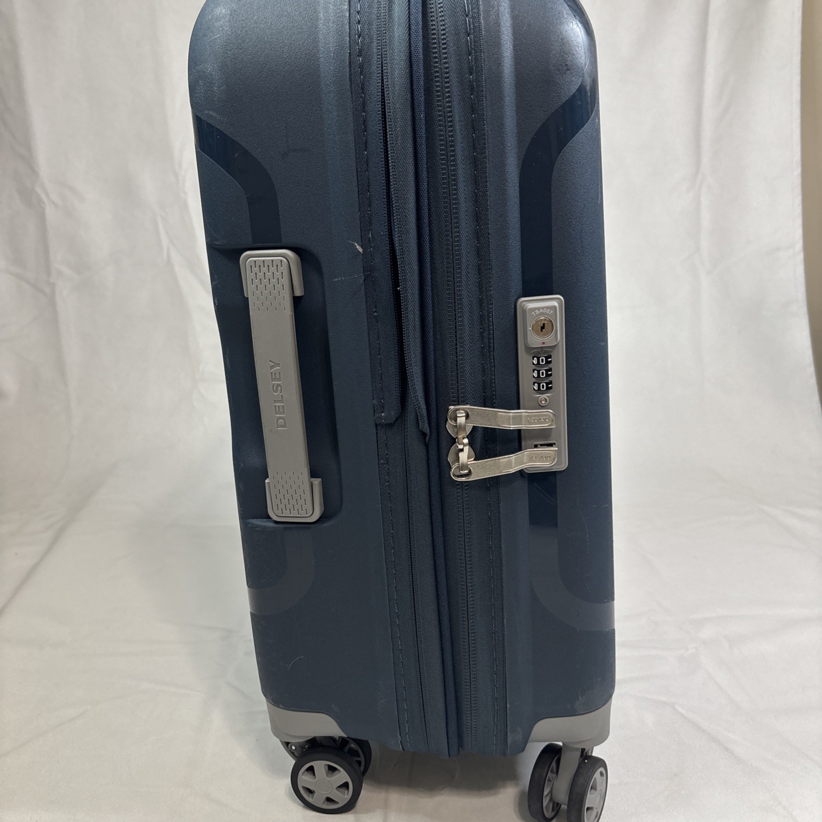 DELSEY Paris Clavel Hardside Expandable Luggage with Spinner Wheels Blue