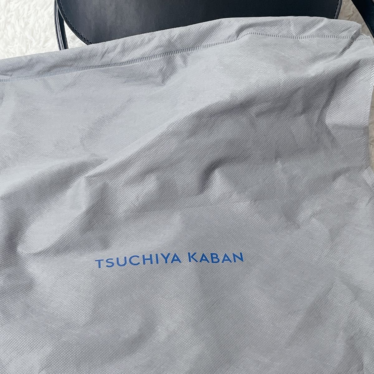 TSUCHIYA KABAN Black Nume Oval Shoulder Bag Adjustable Strap 600ml 15x28x8cm