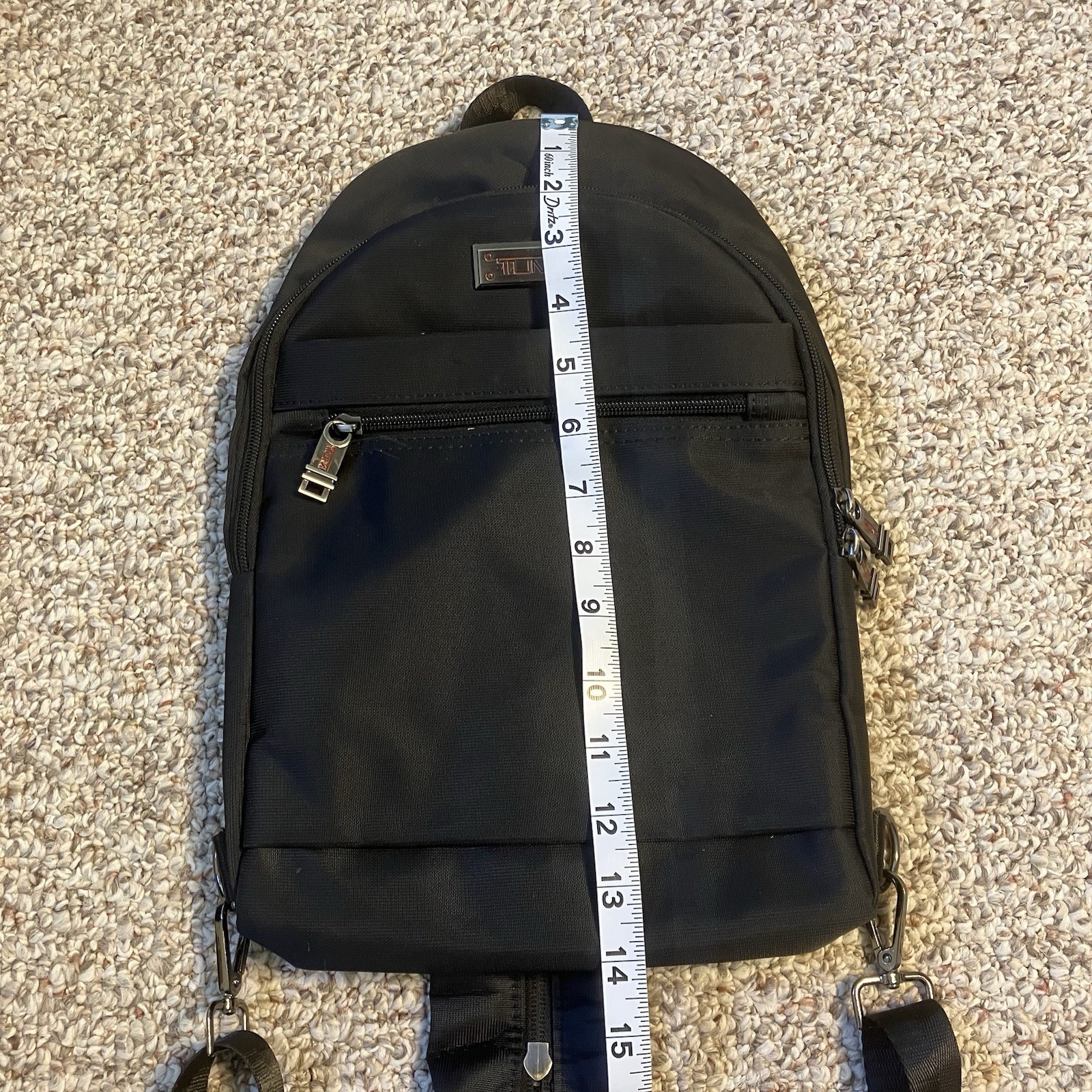 Tumi Black Small Travel Backpack Convertible to Sling Bag Zipper Pockets Charger