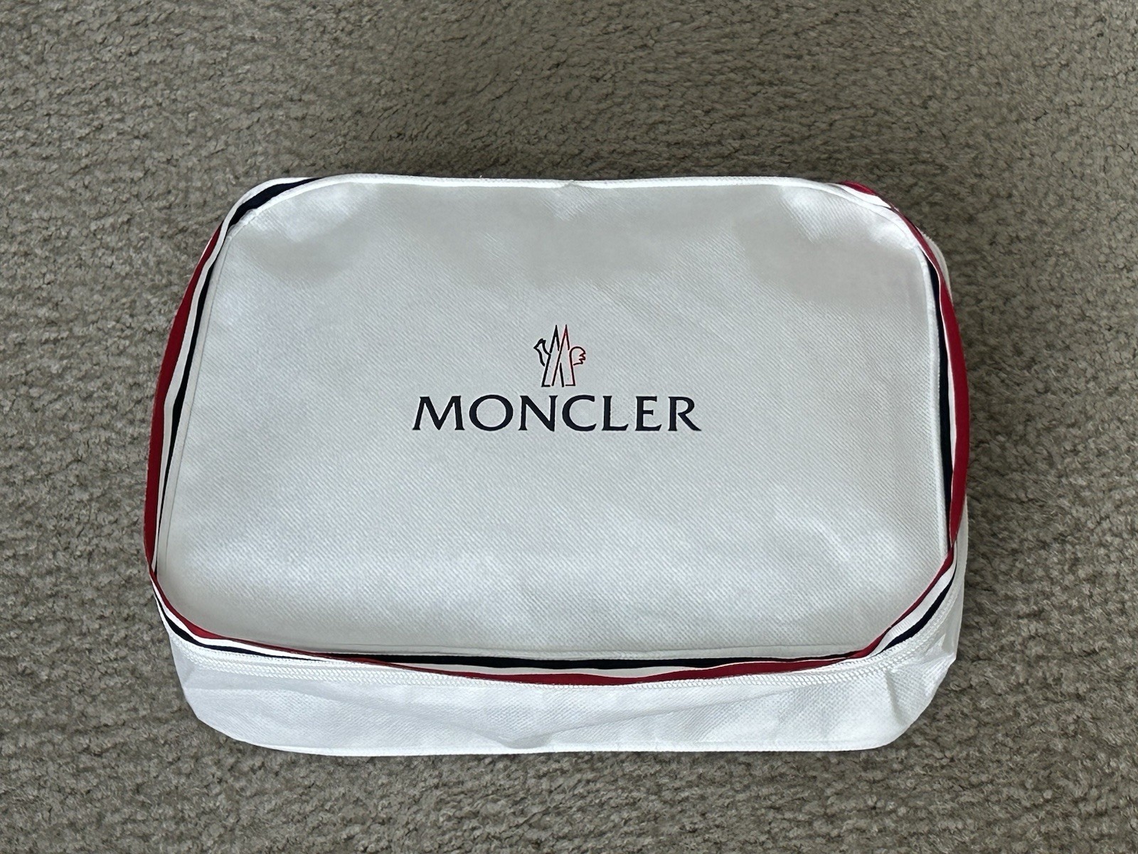 Moncler travel pouch in white 10” x 8.5” x 3”