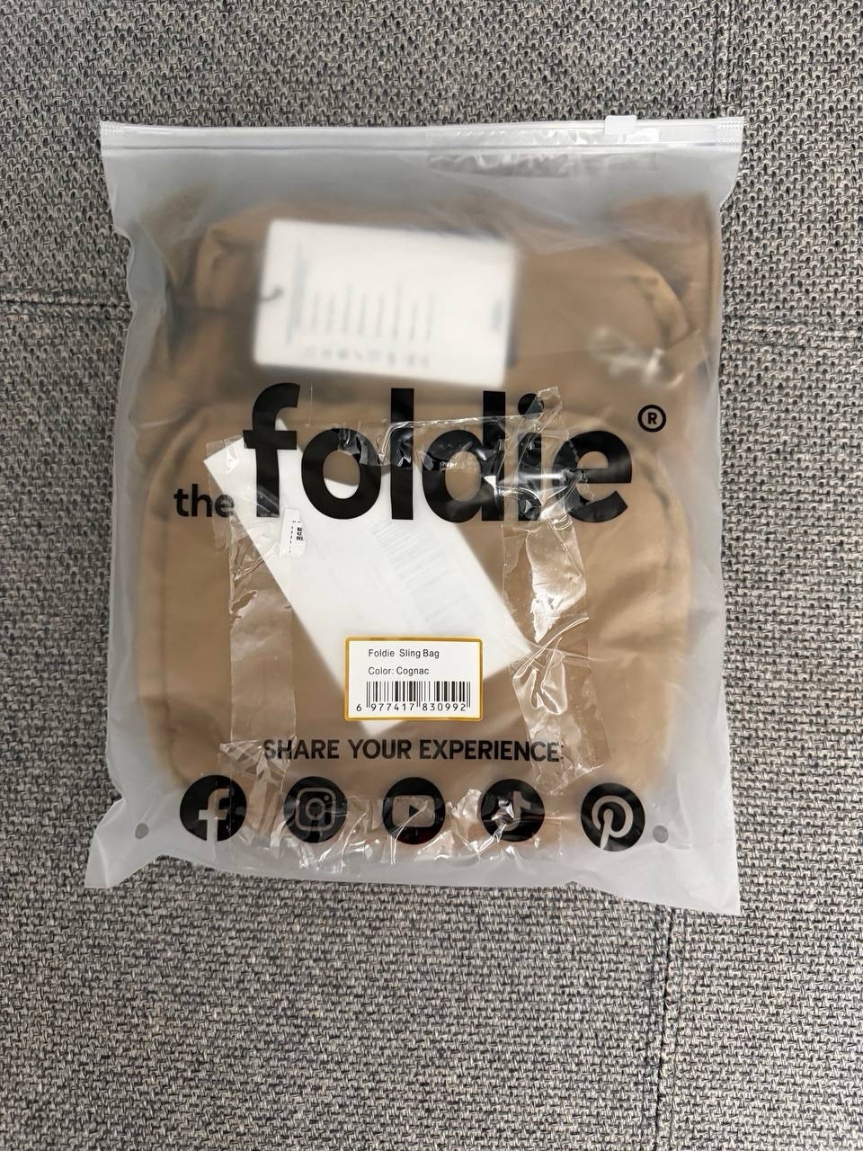 the foldie Small Brown Crossbody Sling Bag Zip Pockets Lined Adjustable Strap