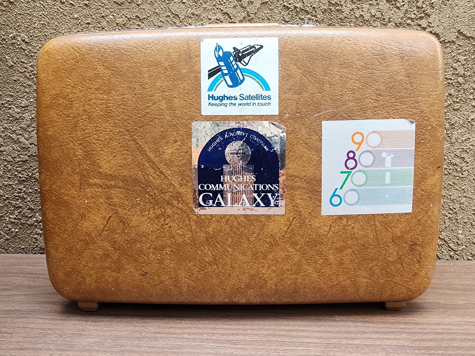 American Tourist Escort Briefcase with Vintage Hughes Aircraft stickers