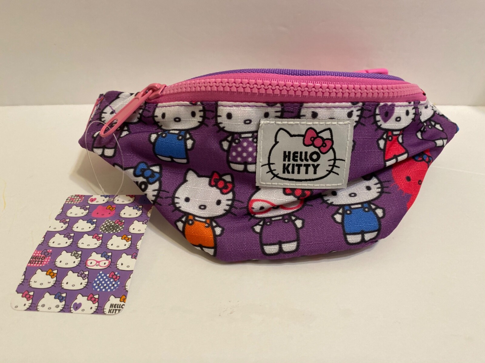 Sanrio hello kitty lavender waist bag for adult. Size:10”Lx4”W, officials