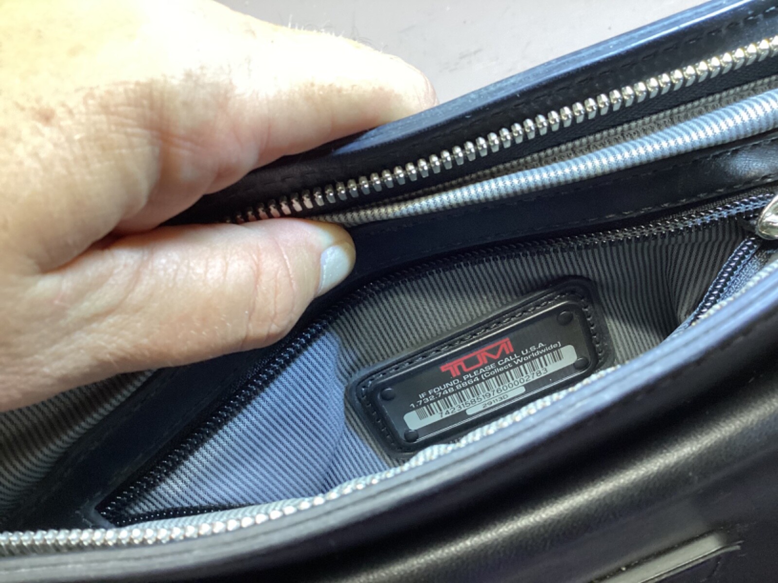 Tumi Men’s Leather and Nylon Crossbody Messenger Bag