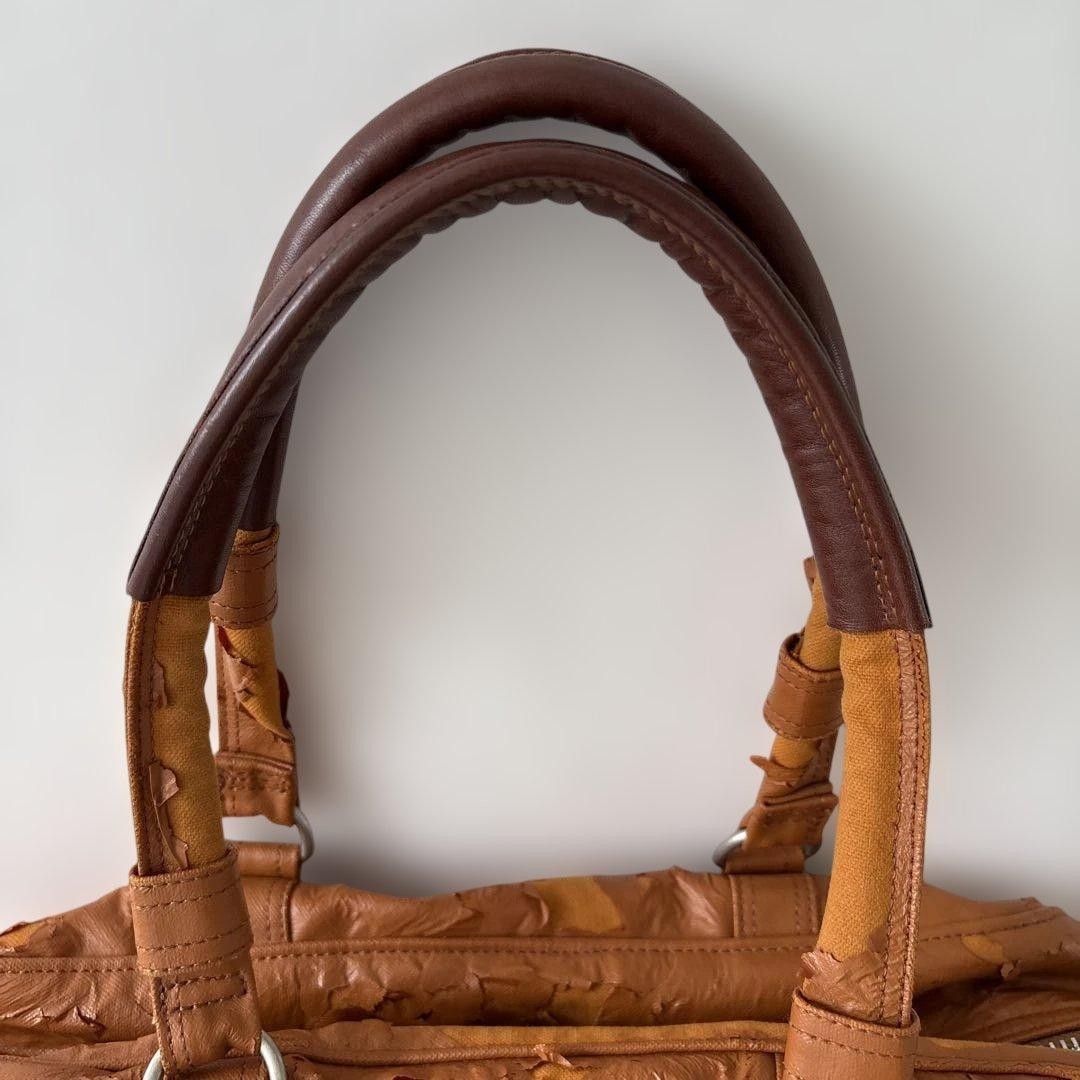 Yoshida & Co. Porter Boston bag, damaged, camel color, synthetic leather