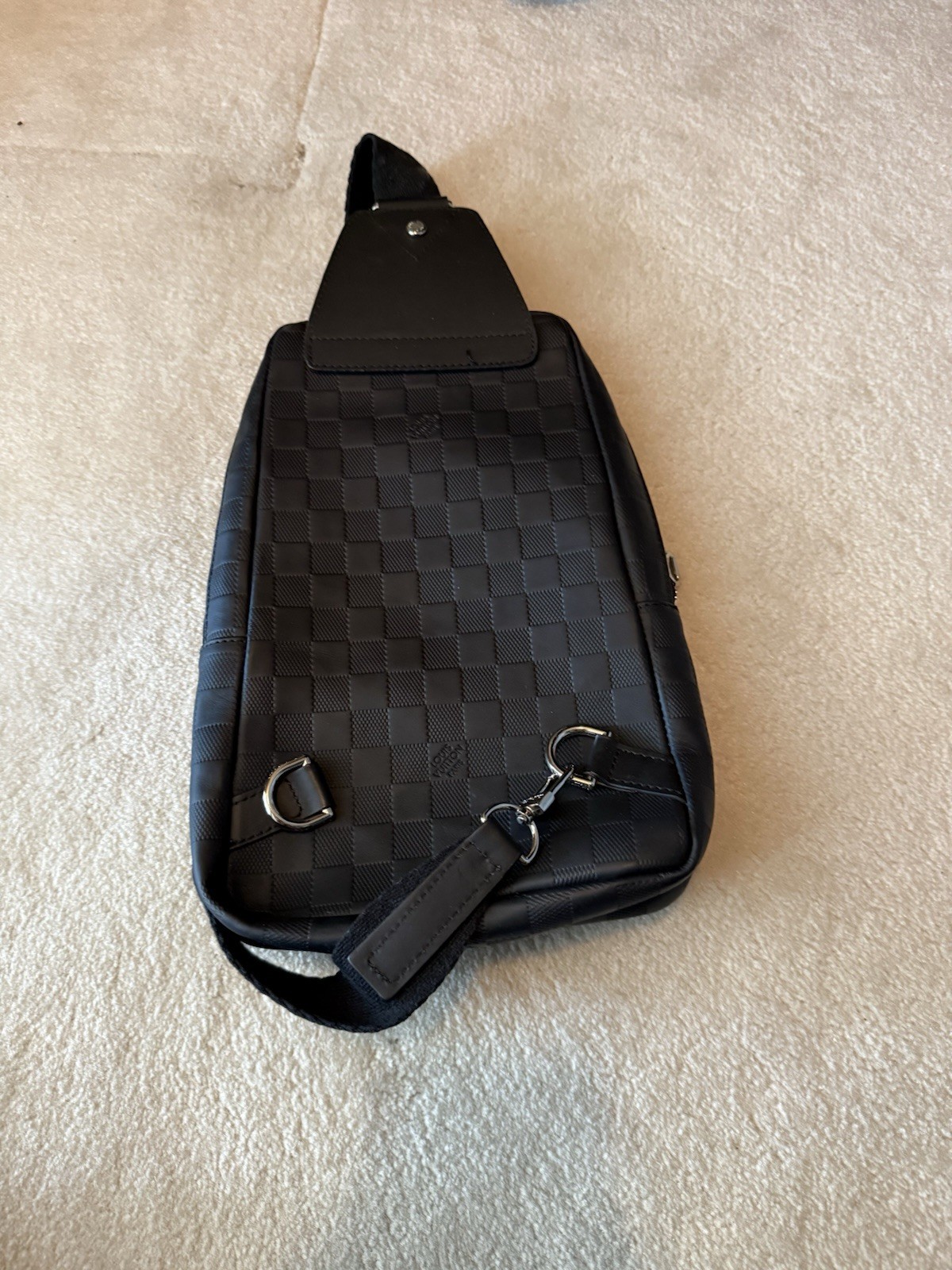 Louis Vuitton Avenue Sling Bag Material: Damier Infini leather (embossed check
