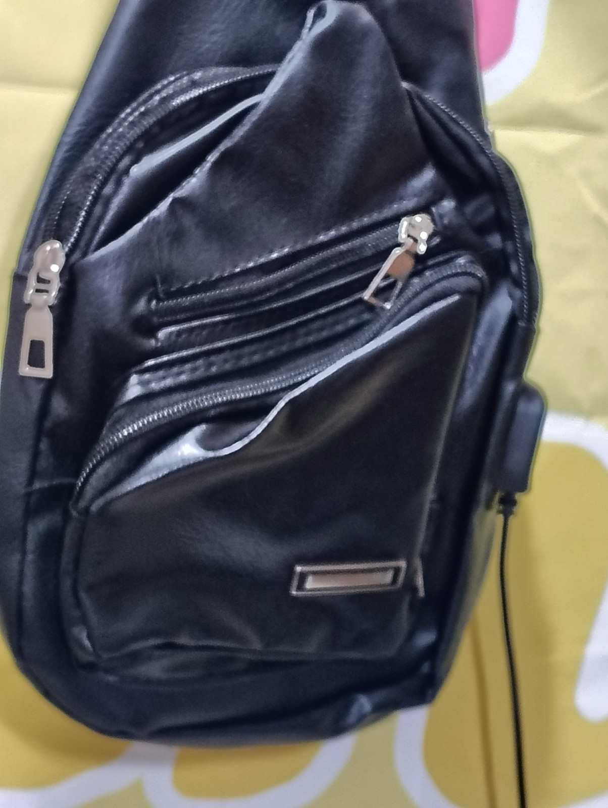 Black Faux Leather Haodier Adjustable Strap USB Port Sling Backpack