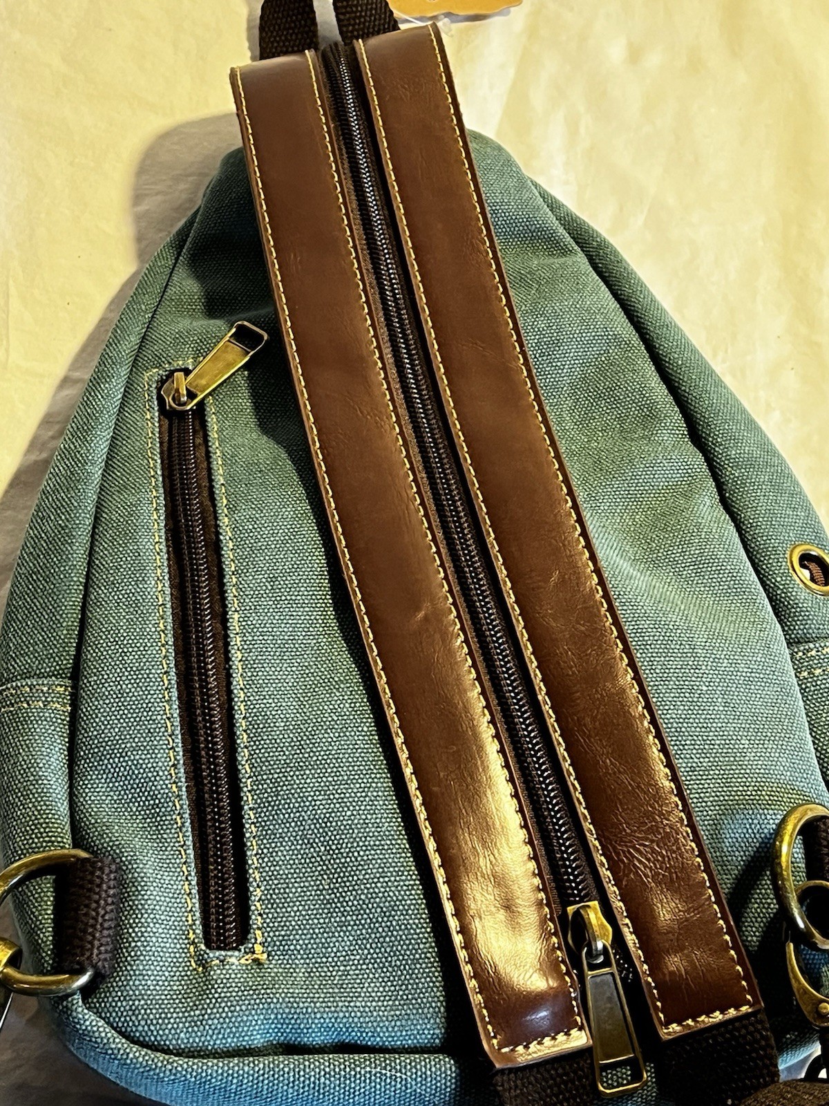 Leisure Sling Bag Backpack Green Brown Zip Closure Outer Pockets Adjustable