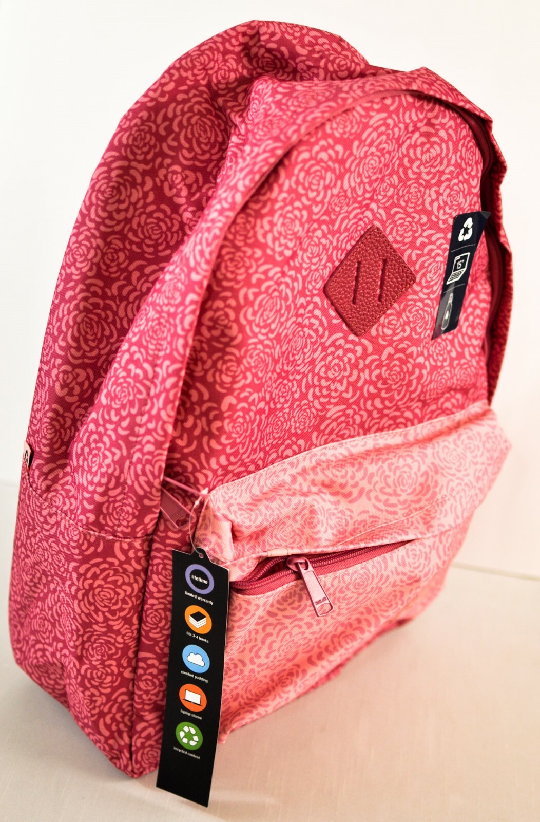 Palo backpack numerous pockets cushion straps laptop sleeve pink floral
