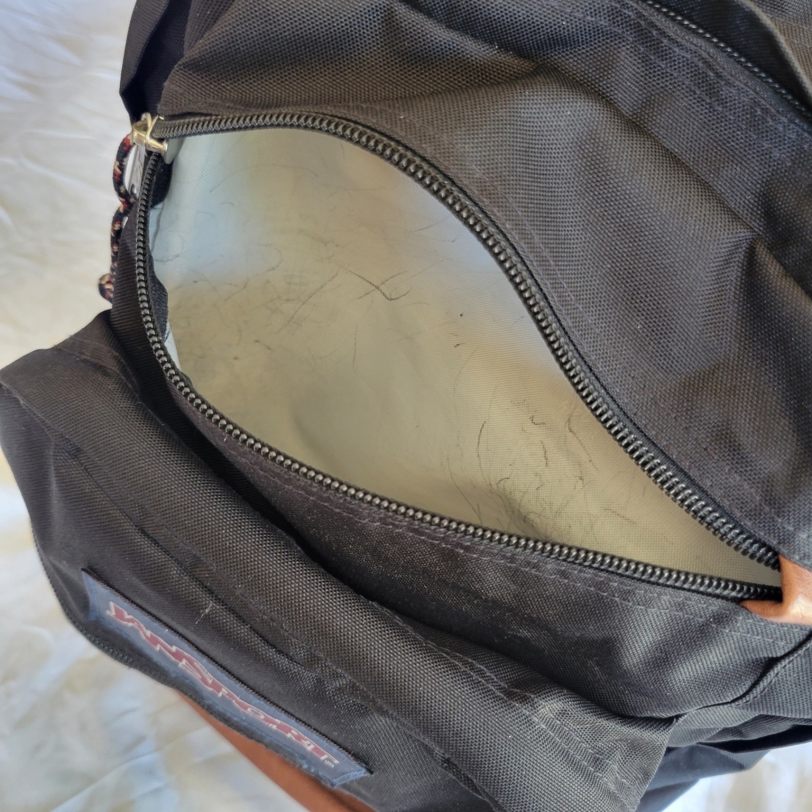 JanSport JS0A2SDD008 Cool Student Backpack – Black Faux Leather Bottom