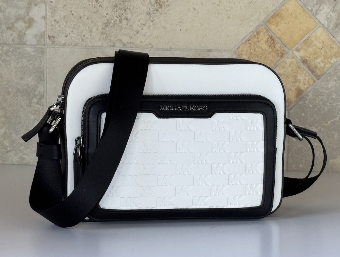 MICHAEL KORS COOPER EAST WEST CROSSBODY FLIGHT BAG MK EMBOSSED BRIGHT WHITE
